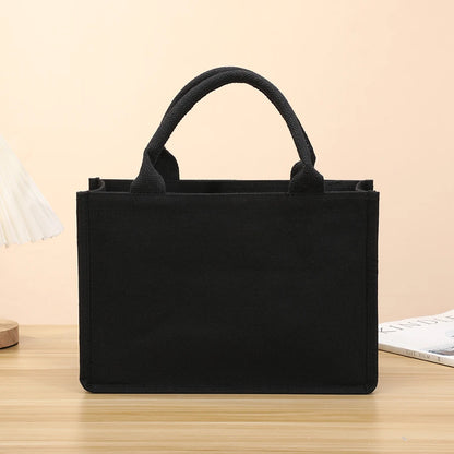 Pure black canvas ladies handbag large capacity open gift shopping bag for outing storage shoulder bag